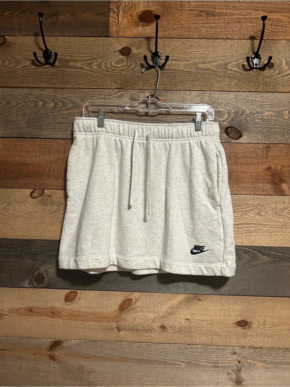 Nike Women's Drawstring Mini Skirt with Black NIKE Logo. Light heather gray
